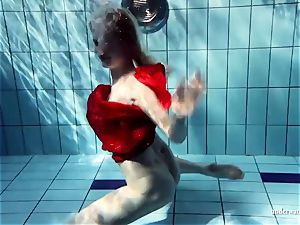 steaming light-haired Lucie French nubile in the pool