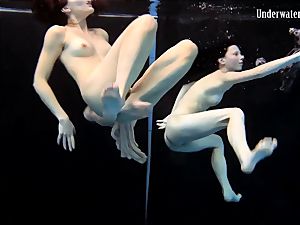 2 ladies swim and get bare marvelous